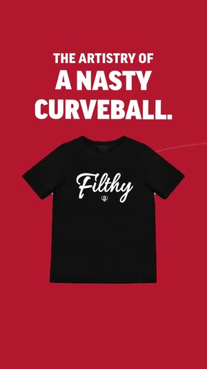 Red frame, black tee, the line “The artistry of a nasty curveball.”